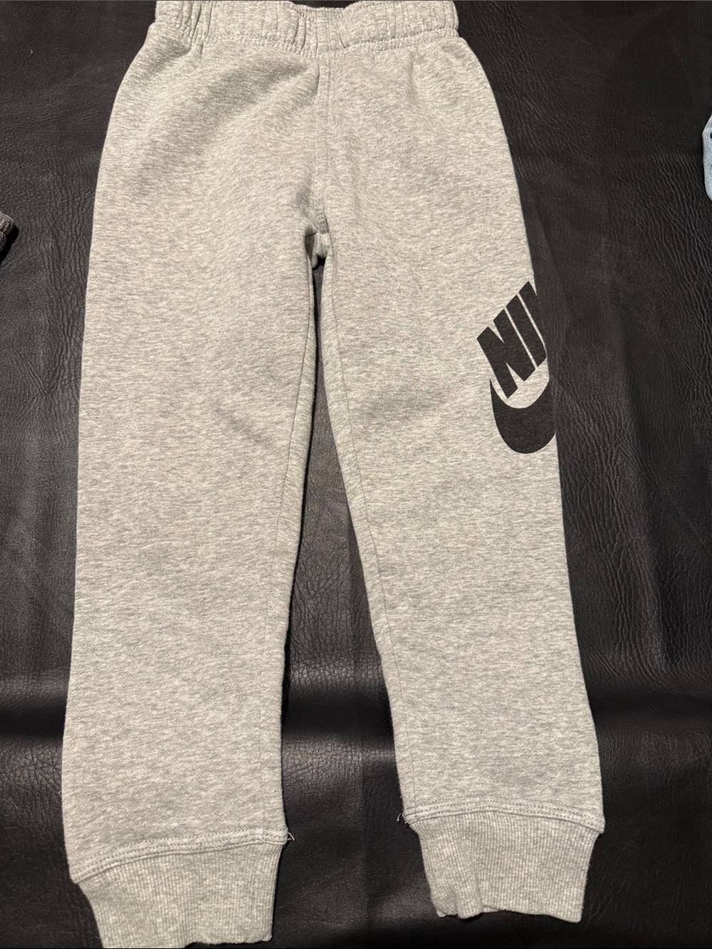 Nike Heather Grey Kids Sweatpants with Black Logo